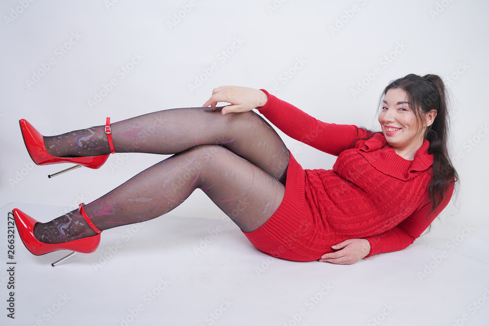 asian panthose pretty asian chubby woman posing in red knitted dress and black fashionable  pantyhose on white studio background の Stock フォト | Adobe Stock