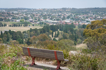 Empty wooden bench on nature lookout, view point