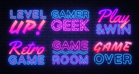 Wall Mural - Gaming Neon signs set Vector. Gamer neon sign, design template, modern trend design, night signboard, night bright advertising, light banner, light art. Vector illustration