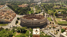 Aerial View On The Coliseum, Rome, Italy. Spring, Summer. Ancient Rome Architecture From Drone.