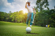 © somchai - Golfer action to win after long putting golf ball on the green golf