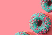 Colorful Background Of Donuts With Copy Space. Top View