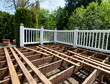© tab62 - Outdoor exterior wooden cedar deck being remodeled with floor boards being removed