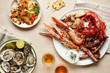 © The Picture Pantry - Tablescape featuring platters of fresh seafood and flatbread