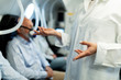 © Drazen - Unrecognizable doctor talking to a patient in hyperbaric chamber.