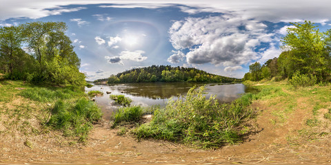 Wall Mural - full seamless spherical panorama 360 degrees angle view on the shore of wide river neman with halo and beautiful clouds in equirectangular projection, ready VR AR virtual reality content