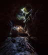 © Nathan Yan/Stocksy - Cave Descent