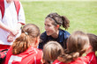 © Jetta Productions/Stocksy - Youth soccer coach