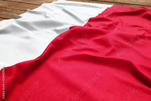 Dekoracja na wymiar  flaga-polski-na-tle-drewniane-biurko-jedwabna-polska-flaga-widok-z-gory
