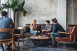 © Lumina/Stocksy - Friends Chatting at Cafe
