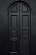 © Photography by Maja Topcagic/Stocksy - Beautiful big black door