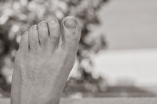Feet Of An Old Man In Black And White