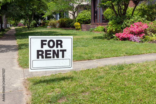 Cuadros en Lienzo FOR RENT sign posted in lawn advertising home for rent.