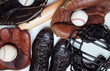© jaflippo - A group of vintage baseball equipment on a wooden background. Jersey is from a high school jersey in Arkansas and logo is not copyrighted.