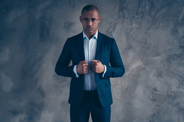 Wall Mural - Portrait of gorgeous handsome trendy agent representative independent concentrated think thoughtful contemplation touch fashionable short hair bald blazer jacket isolated on dark background
