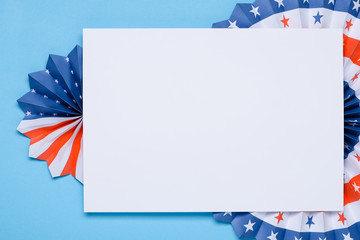 Independence Day lanterns template. 4th of July holiday banner design. USA flag colors paper fans on blue background.