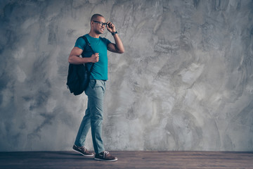 Wall Mural - Full length side profile body size photo amazing he him his dark skin macho handsome motion go classes lessons carry rear bag wear specs casual blue t-shirt pants shoes isolated grey background
