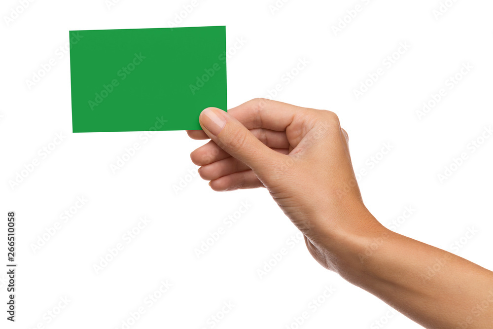 Green card in woman's hand - obrazy, fototapety, plakaty 
