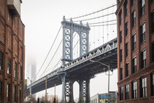 View Of Dumbo And The Manhattan Bridge In The Streets Of Brooklyn - New York City, NY