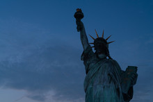 Statue Of Liberty At Night With Copyspace.