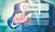 © Duncan Andison - A business man selection a News button on a futuristic display with a concept written on it.