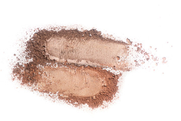 Broken brown eyeshadow palette isolated on a white background.