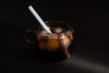 A Cool Glass Of Cola Drink With Ice