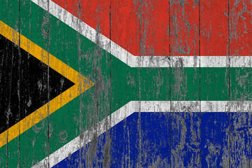 Wall Mural - Flag of South Africa painted on worn out wooden texture background.