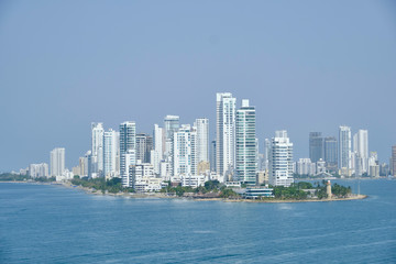 Scenic view of downtown of Cartagena de Indias - old historical touristic town in Colombia. Beautiful summer sunny look of skyline of skyscrapers on coast of Caribbean sea in country in South America