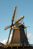 Fototapeta  - old rustic windmill from Netherland holland amsterdam