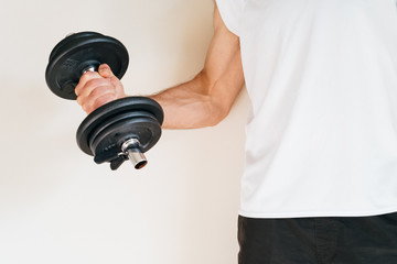 Man lifting weights at the gym