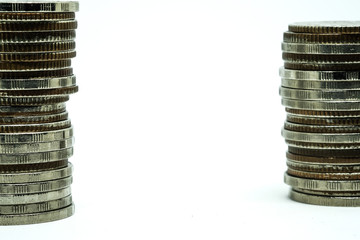 Coin stacks in a row, Euro money, currency. Success, wealth and poverty, poorness concept. Euro coins stack on grey background with copy space.