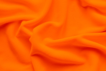 Textureof vibrant orange fleece