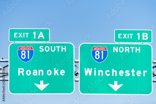 Green Road Signs In Virginia For Exits 1a And 1b To Roanoke And Winchester Along Interstate Highway 81 South And North Isolated Against Blue Sky Stock Photo Adobe Stock