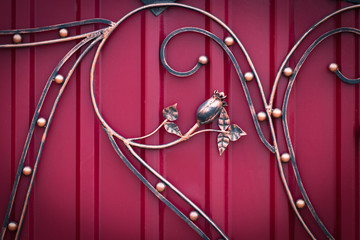 wrought-iron gates, ornamental forging, forged elements close-up