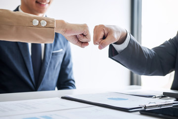 Aufkleber - Teamwork of businessman partnership giving fist bump to greeting start up business strategy project