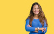 © Krakenimages.com - Young beautiful brunette woman wearing blue sweater over isolated background happy face smiling with crossed arms looking at the camera. Positive person.