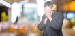 © Krakenimages.com - Young Christian priest over isolated background with sad expression covering face with hands while crying. Depression concept.