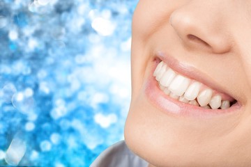 Sticker - Beautiful wide smile of young fresh woman with great healthy white teeth. Isolated over white background