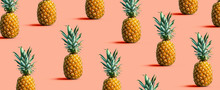 Many Pineapples On A Solid Color Background