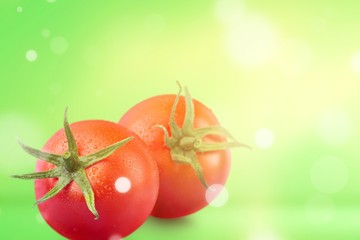 Canvas Print - Two tomato vegetable green background