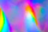 Fototapeta Tęcza - Blurry abstract iridescent holographic foil background.