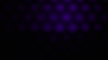 Flashing violet light.Blurred violet Light on black background.