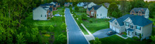 Aerial Panorama Of Modern Upper Middle Class Single Family Homes Neighborhood Street American Real Estate In A New Construction In Maryland USA	