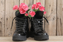 Bunch Of Flowers In Black Combat Boots