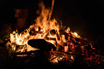 Night campfire with available space at left side.