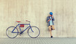 people, style, technology, leisure and lifestyle - young hipster man in earphones with smartphone and fixed gear bike listening to music at city street wall