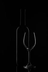 Wine bottle and wineglass