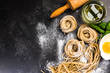 Raw uncooked homemade pasta ingredients, border background