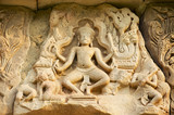 Sandstone carving with religious motifs at the ruins of the Hindu temple in Phimai historical park (Prasat Hin Phimai) in Thailand.